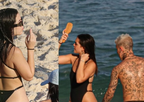 Mel Maia e MC Daniel fumam cigarrinho em praia e atriz ganha mão boba do ex