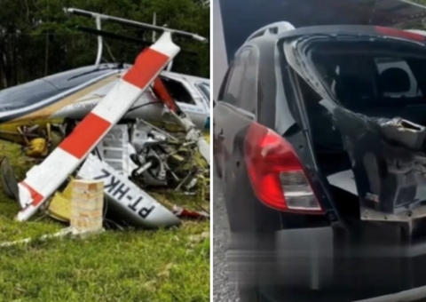 Helicóptero cai com 5 pessoas e hélice atinge carro