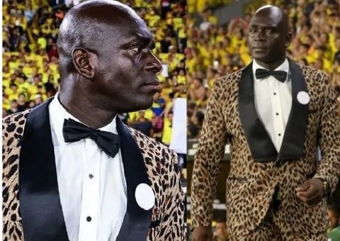 Por terno 'oncinha', técnico recebe multa milionária da Conmebol; entenda