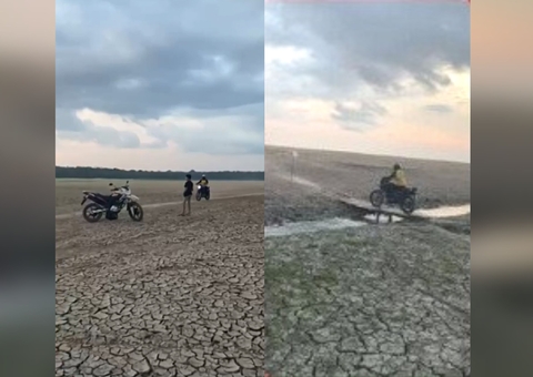 Seca transforma lago do Amazonas em estrada e pessoas fazem travessia em motocicletas; vídeo