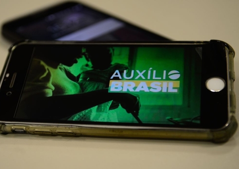 Caixa suspende consignado do Auxílio Brasil