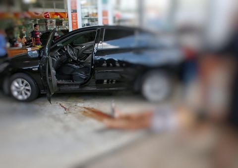 Motorista executado em posto de Manaus levou mais de 7 tiros, esposa também foi ferida