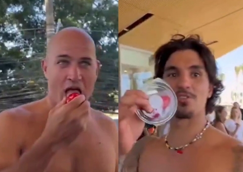 Medina dá 'morango do amor' para lenda do surfe provar e reação diverte internautas; vídeo