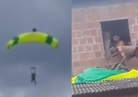 Vídeo: Paraquedista despenca sobre telhado de casa em Manaus