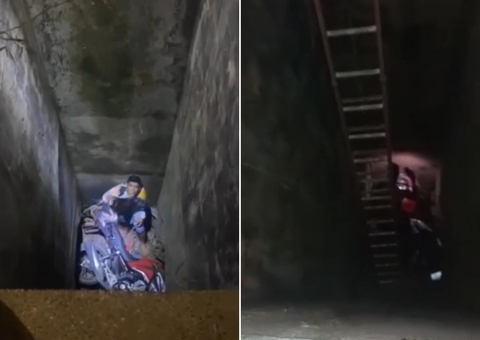 Motociclista cai em buraco de mais de 8 metros e passageira fica ferida em Iranduba; vídeo