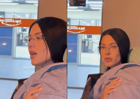 Namorada de Belo vai à delegacia com filho no colo e consegue medida protetiva