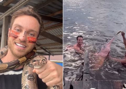 Ex-BBB Lucas Bissoli nada com botos e come pirarucu em visita a Manaus