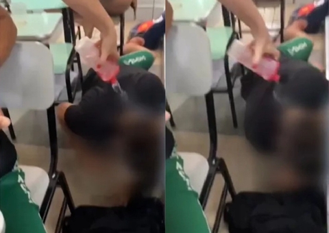 Professora joga água em aluno dormindo em sala de aula; vídeo