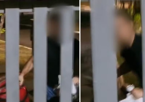 Cliente arremessa bag de entregador pelo portão após discussão
