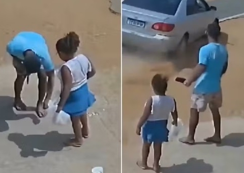 Vídeo: Pai e filha escapam de atropelamento ao parar para pegar moeda no chão