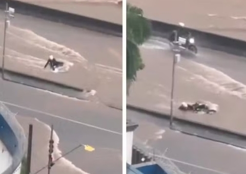 Motociclista é arrastado por enchente em Santo André e socorrido por colega
