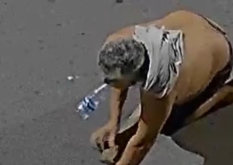 Câmera registra queda de acusado de matar casal ao tentar esconder arma