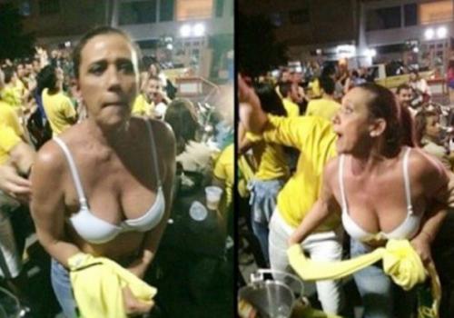 Rita Cadillac cumpre promessa e fica só de sutiã em meio a multidão